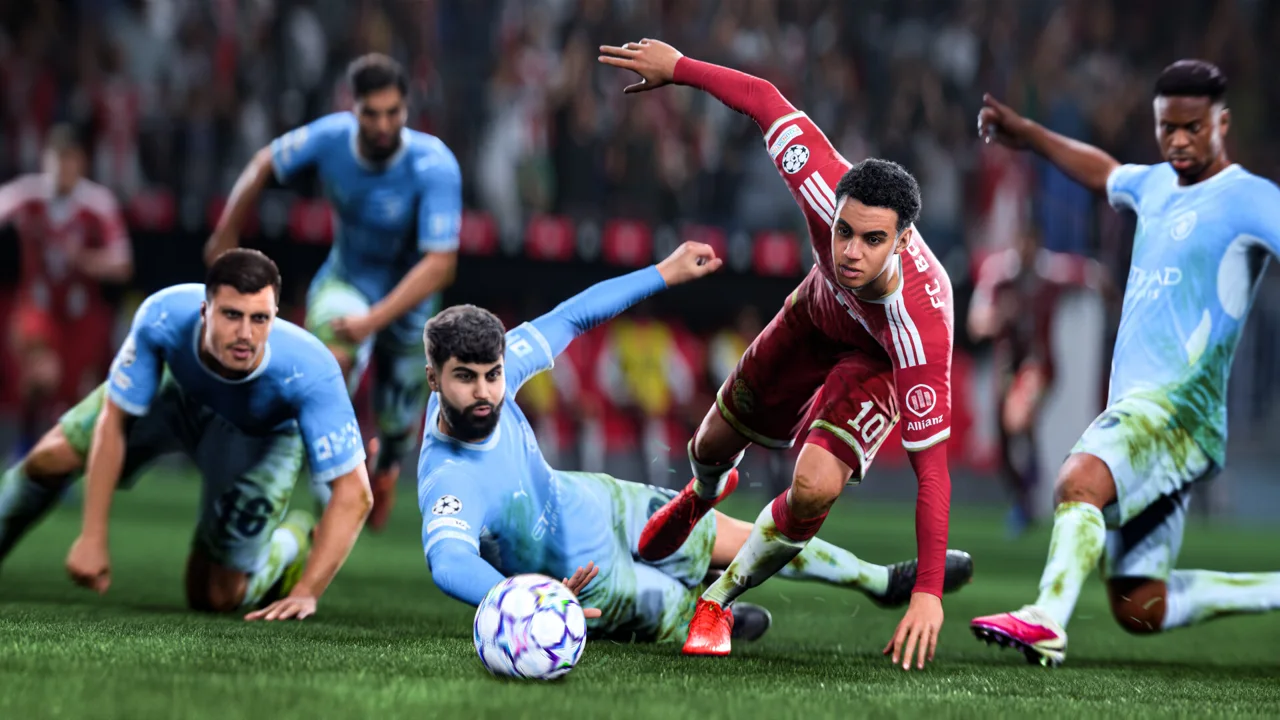 Jamal Musiala in a red Bayern kit challenging defenders in sky-blue kits.